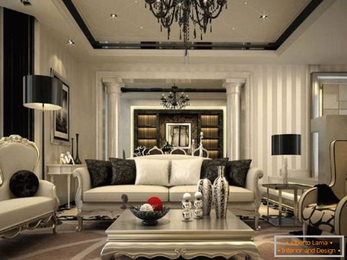 Изузетан ентеријер за дневну собу осмишљен је у неокласичном стилу. Црни елементи декорације и декорације су видљиви на позадини сивих сенки.