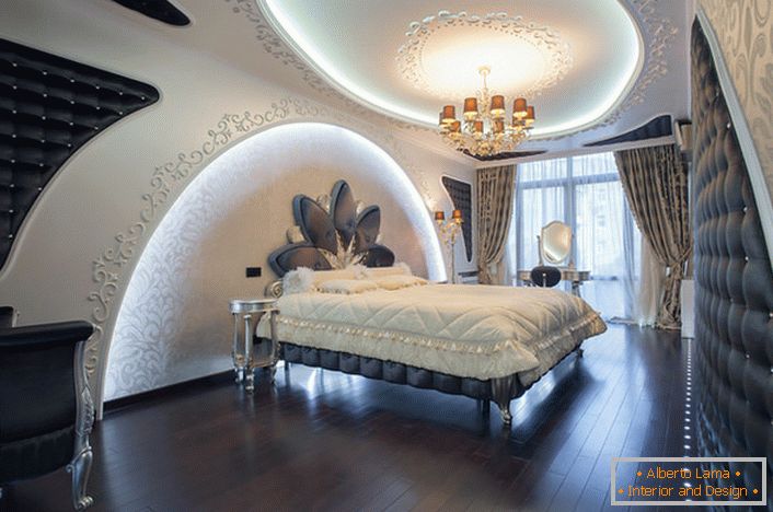 Дрвени паркет тамне боје складно се разграђа у амбијенту спаваће собе у високотехнолошком стилу.