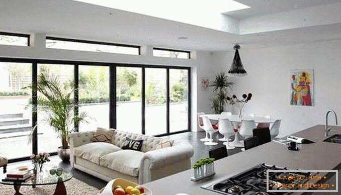 Дизајн студио апартмани са панорамским прозорима - фотографија кухиње дневне собе