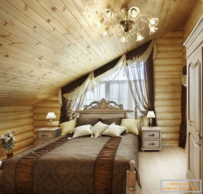Необично решење за спаваћу собу у стилу државе. На краљевско меканом кревету, створеном на мотивима барока, изврсно се гледа у општи рурални концепт унутрашњости.